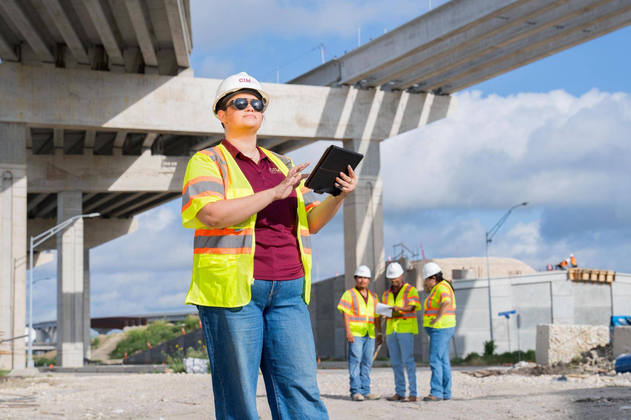 A Concrete Industry Management Student at a bridge construction site.