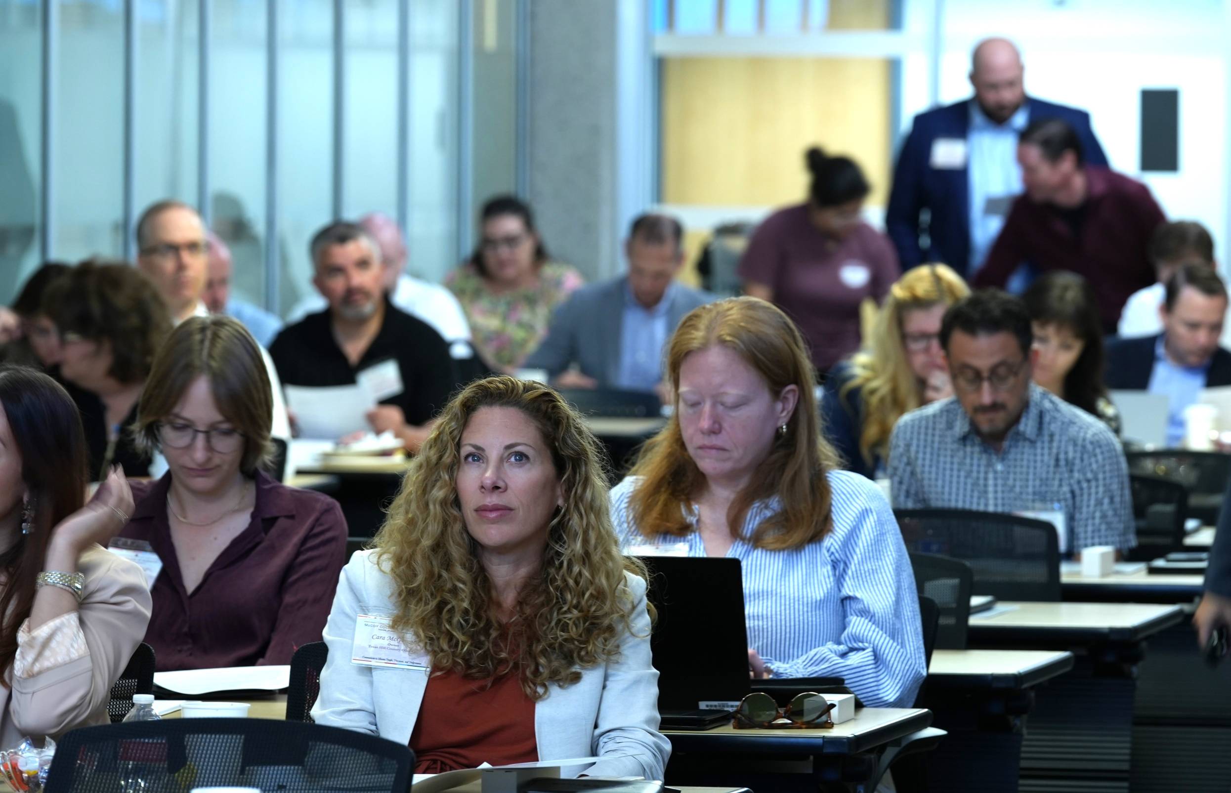 Group sitting in a presentation.