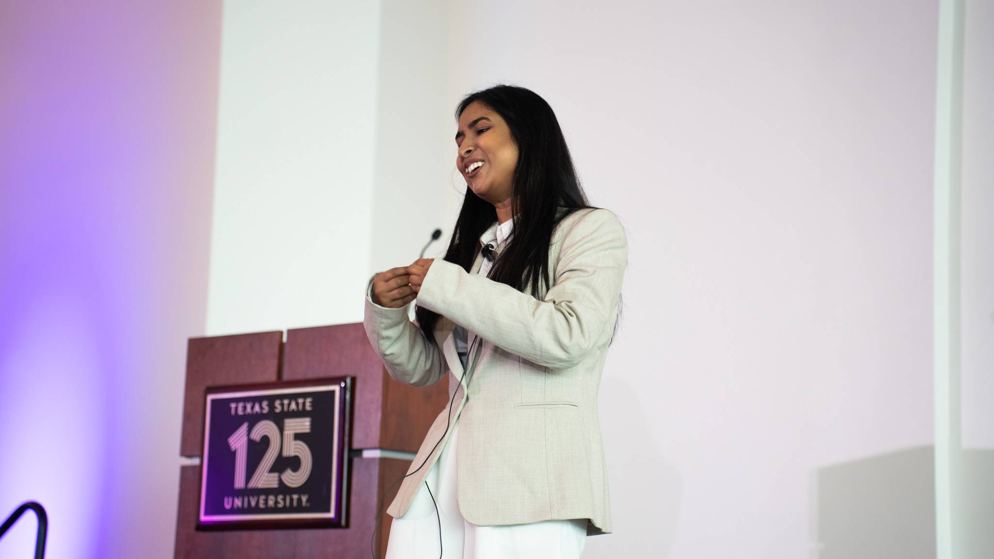woman speaking during presentation