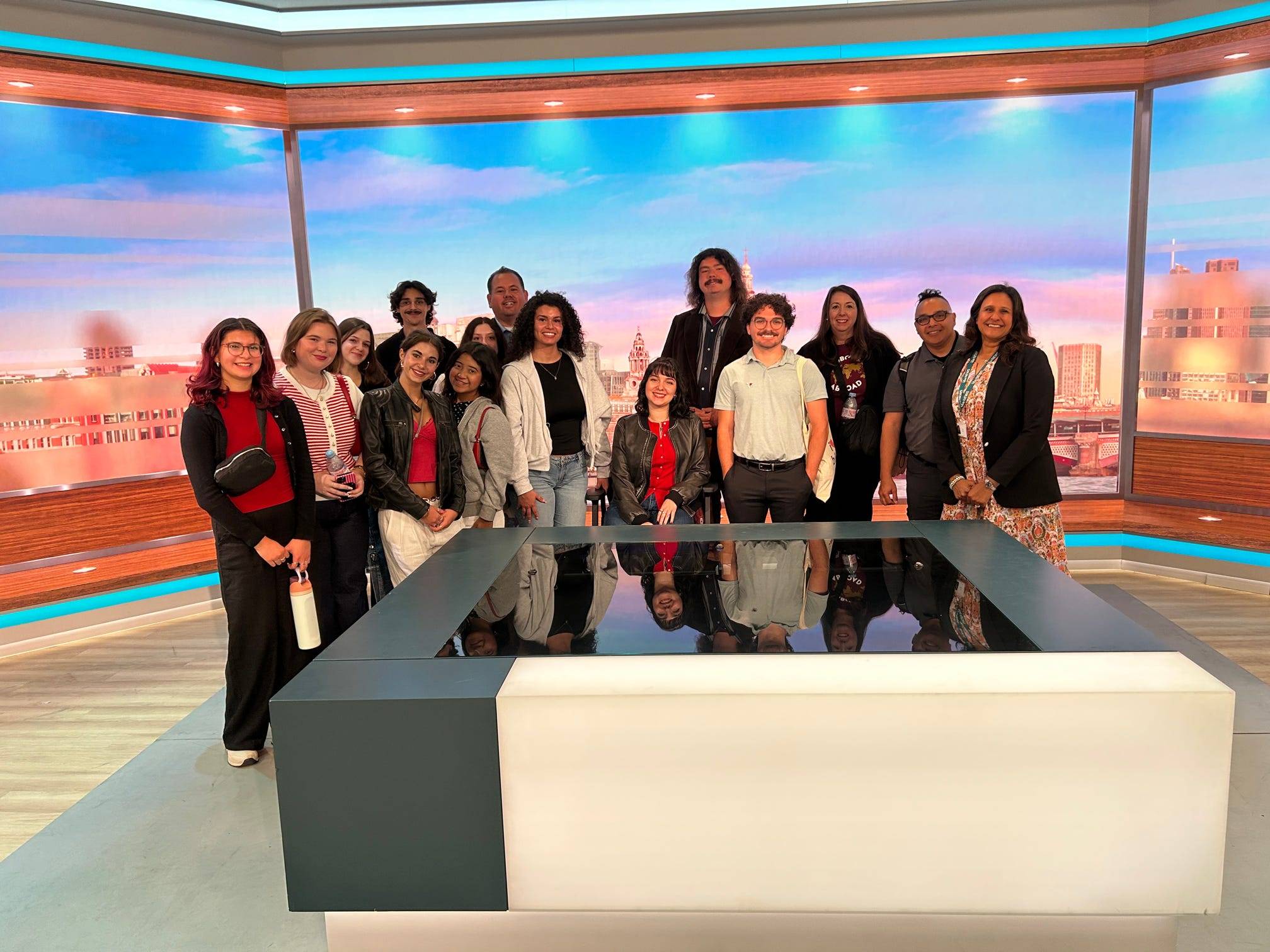 a group of texas state students and staff members standing in the set of the ITV breakfast program, Good Morning Britain