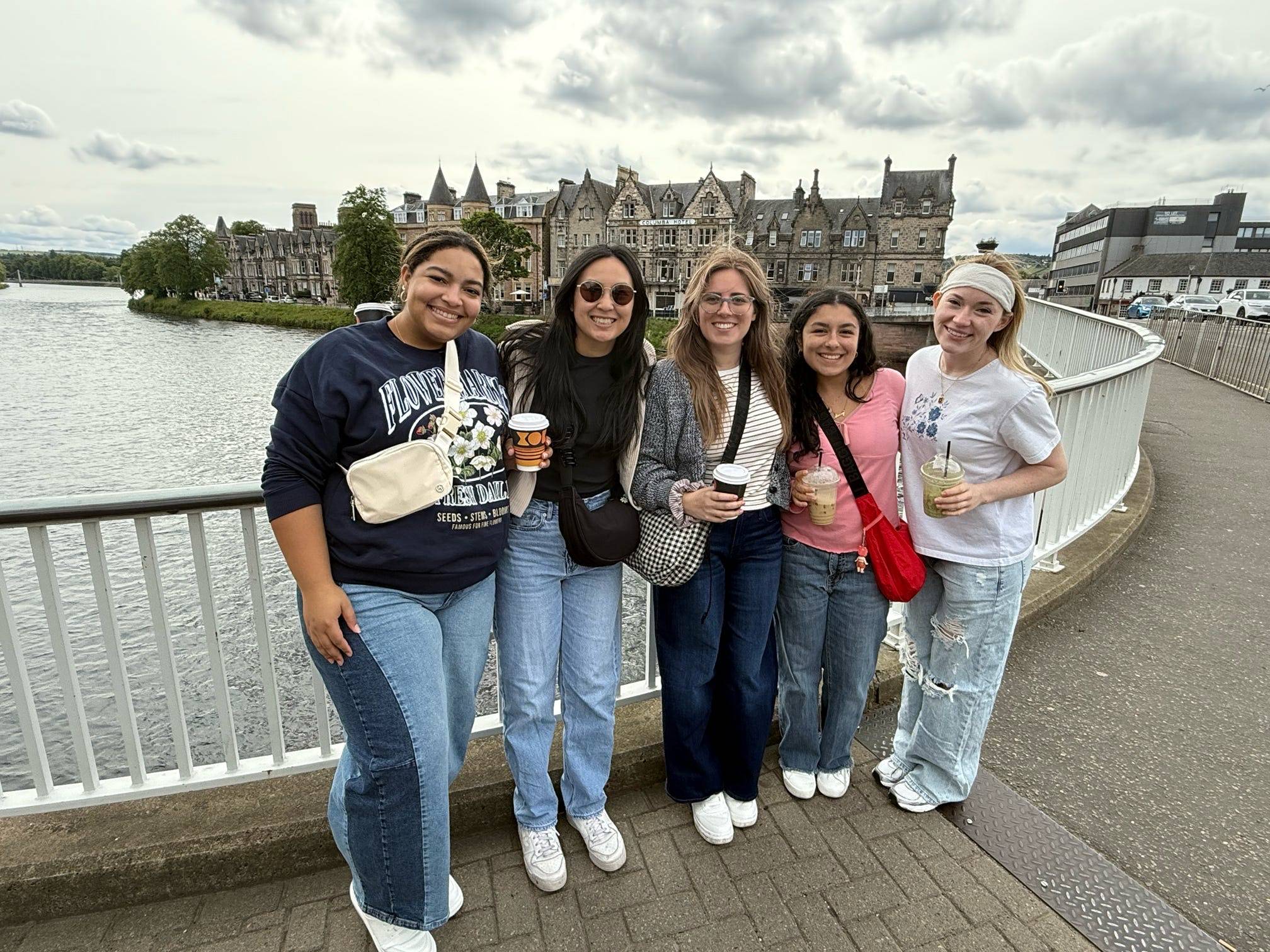 Students on the bridge over the River Ness.