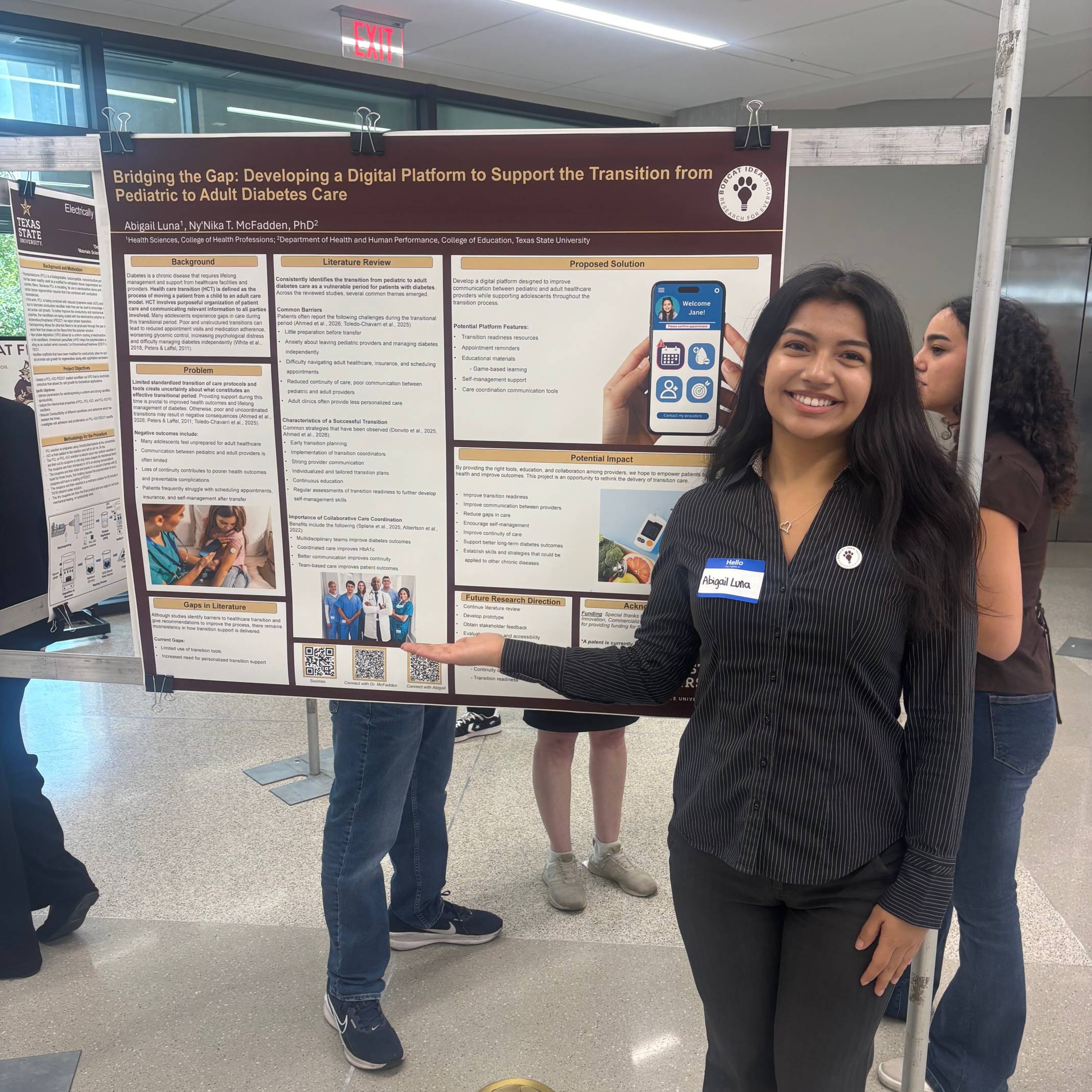Abigail Luna presenting a poster