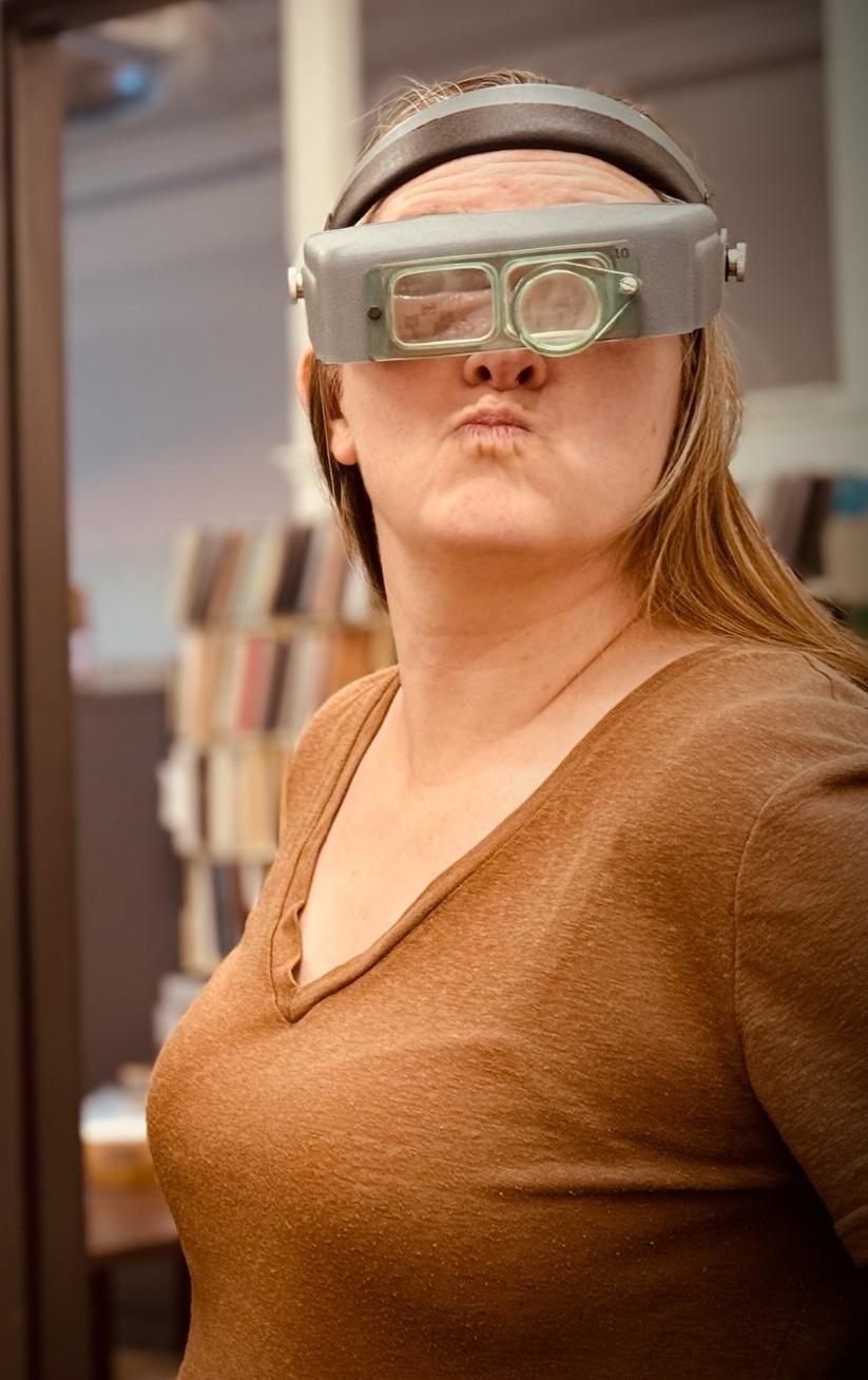 picture of Katie with binocular glasses on