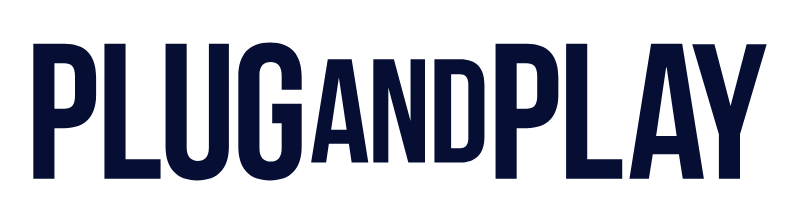 Plug and Play logo featuring the words “PLUG AND PLAY” in bold, uppercase navy lettering on a clean white background.