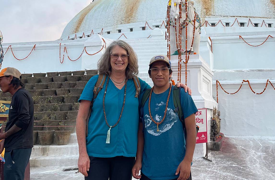 Holly Wissler and Dante at the Boudhanath Stupa in Nepal.