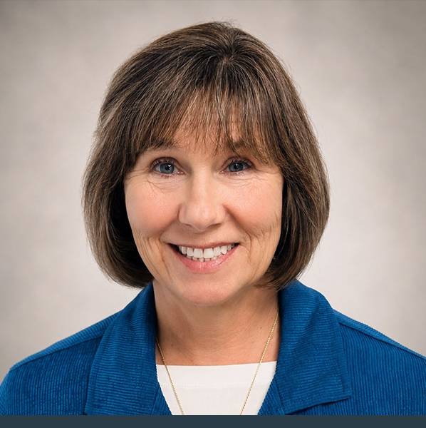 A headshot photo of Dr. Lori Czop Assaf