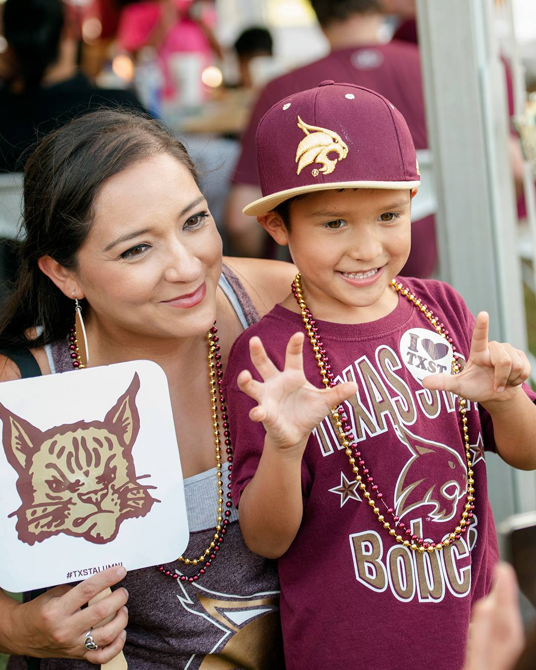 Mother and son at a Texas State pregame event