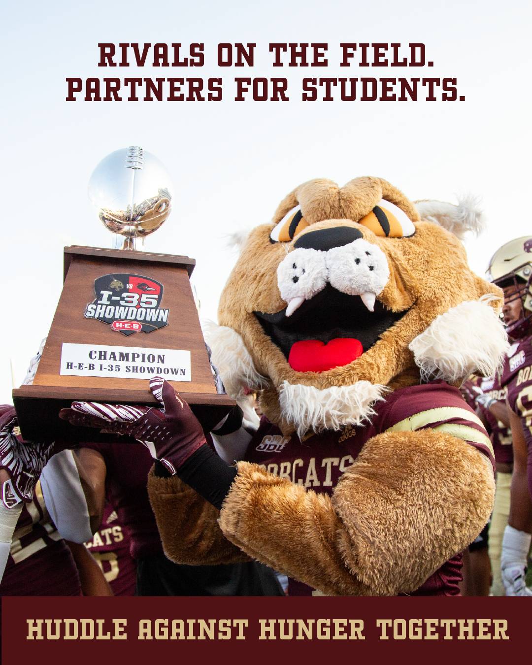 Photo of Boko the Bobcat holding the I-35 Showdown trophy after the Texas State won against UTSA with text reading "rivals on the field, partners for students, Huddle Against Hunger Together"
