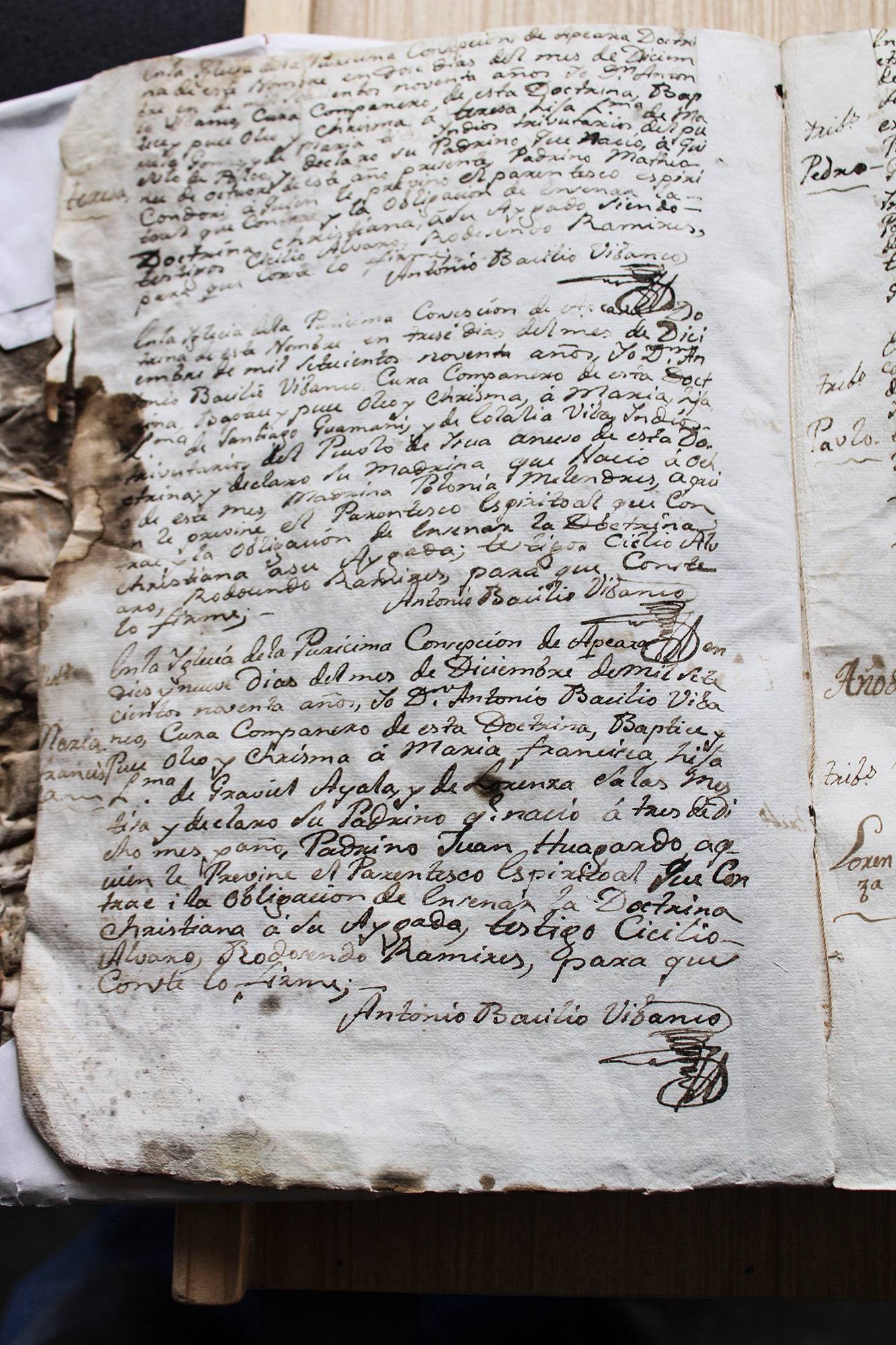 A hand written, stained piece of paper from the 18th century.