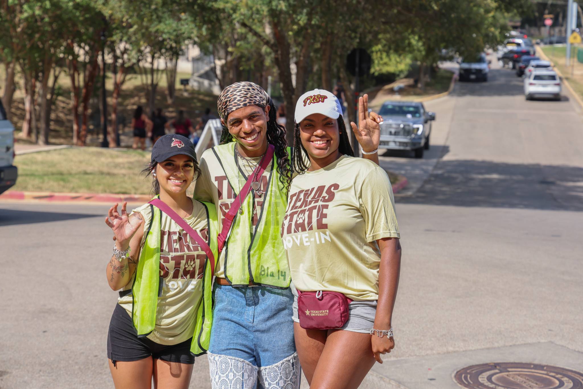 Three RAs directing traffic during move-in.