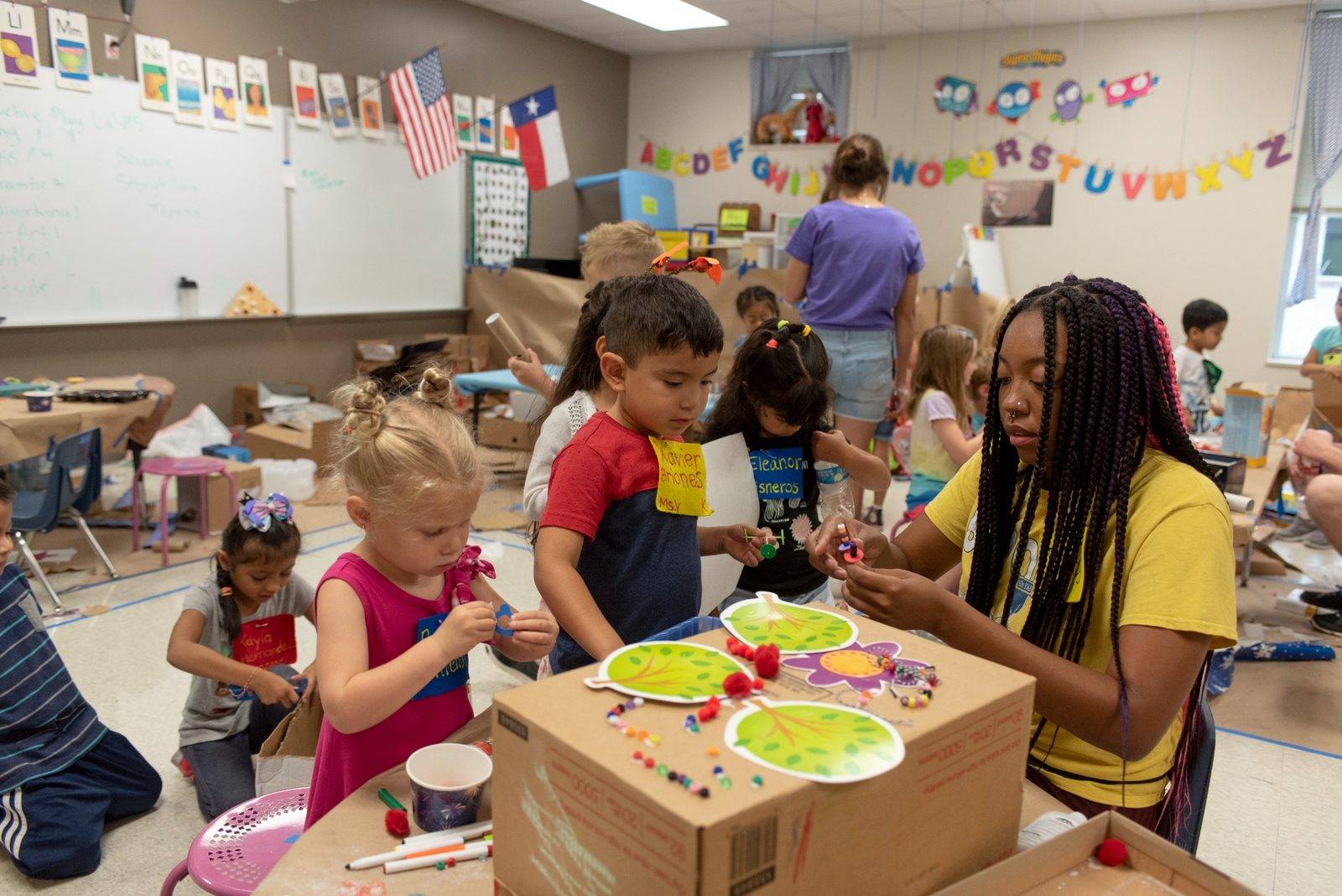 Education students working with young students
