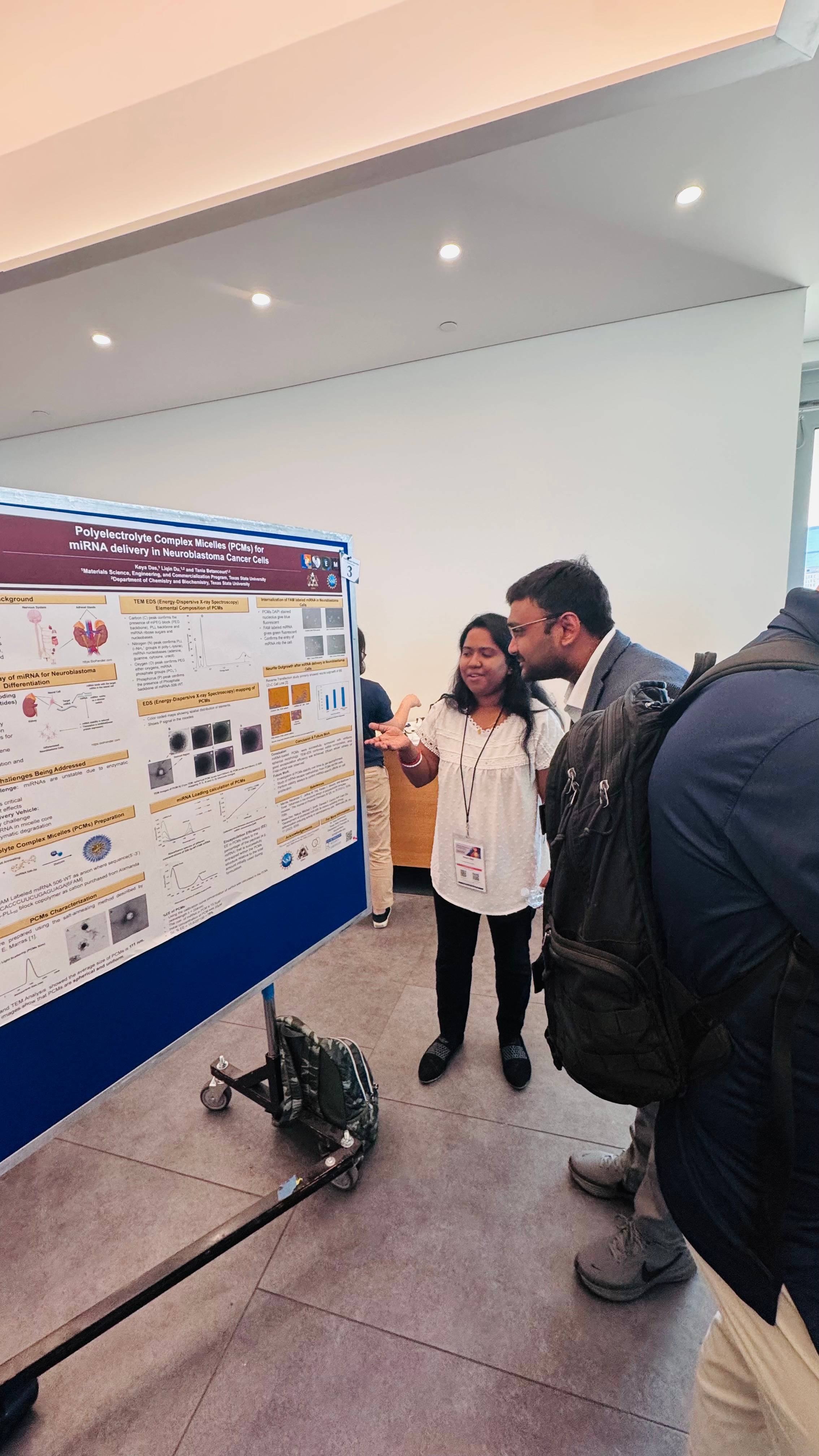 PREM Student presenting research at poster session