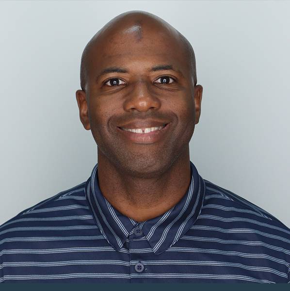 A headshot photo of Raymond B. Davis