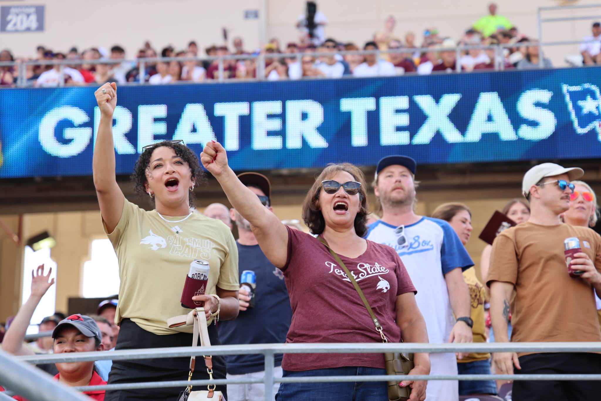 Family cheering at football game