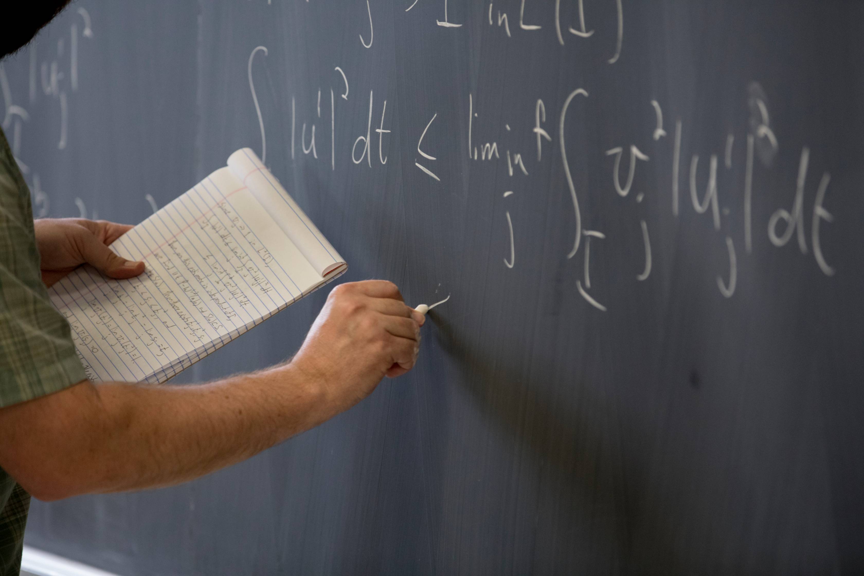 A person solving a math problem