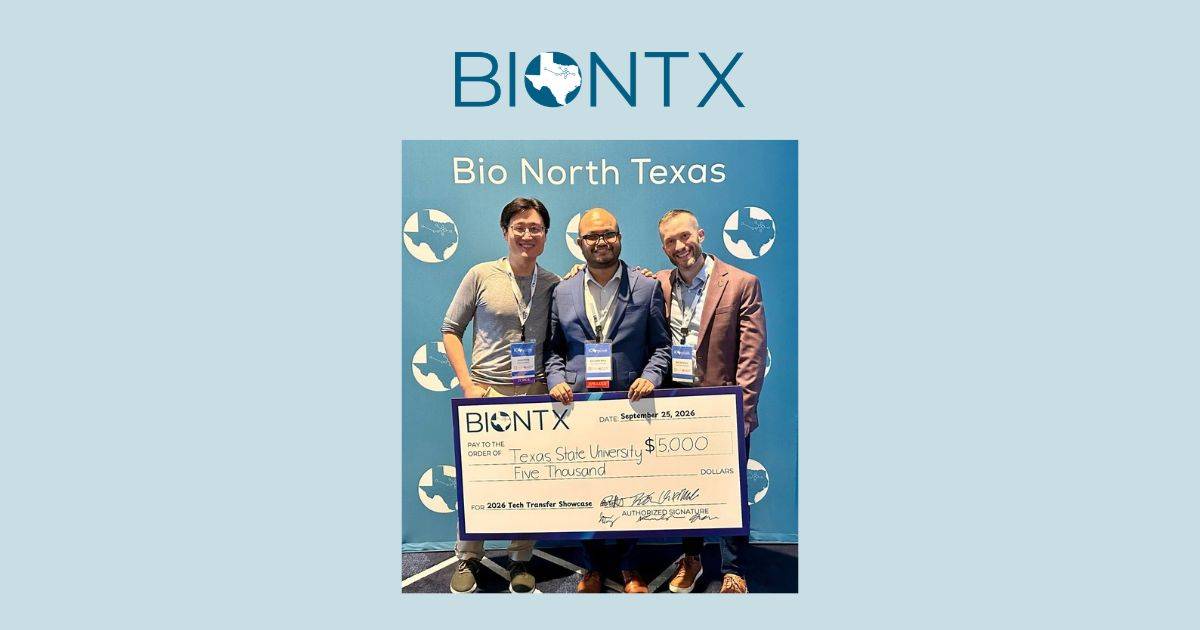 Dr. Aniruddha Bora with his colleagues at the BioNTX Tech Transfer Showcase holding a big check 