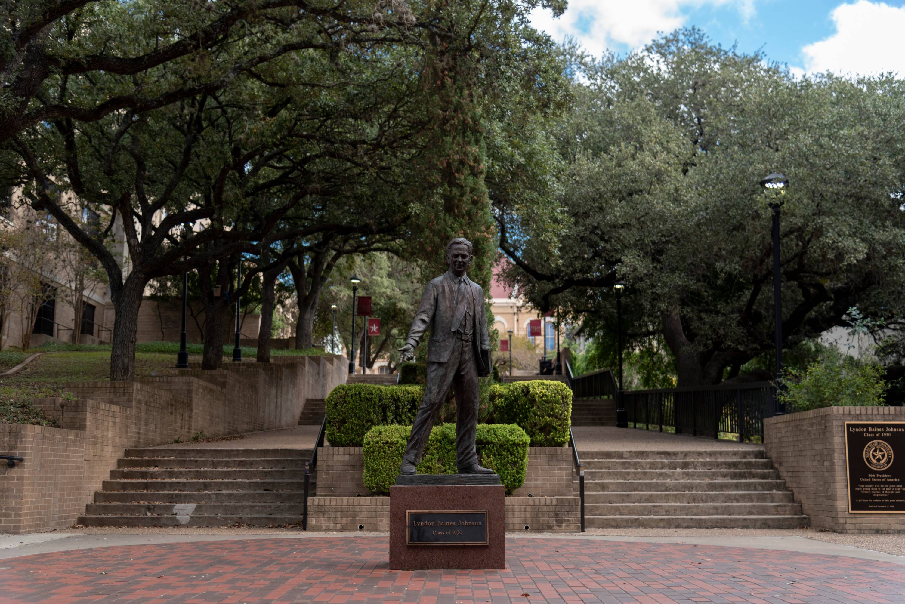 statue of lbj outside of Evans Hall